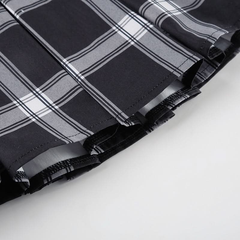 Pleated plaid zip-up mini skirt