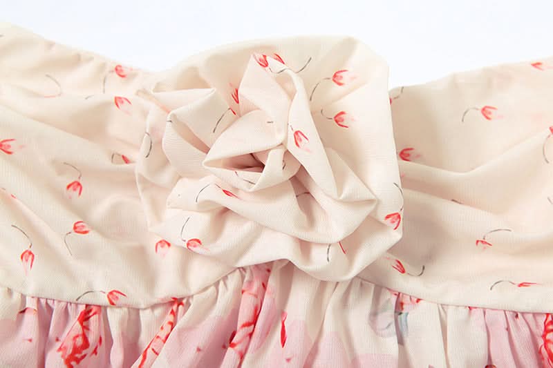 Flower applique ruffle print top