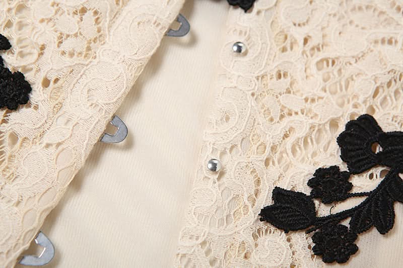 Off shoulder flower applique button top