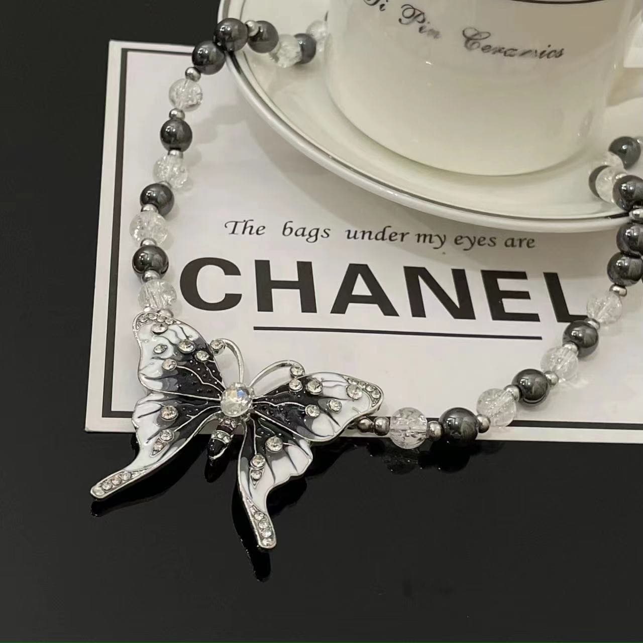 Butterfly beaded black and white necklace