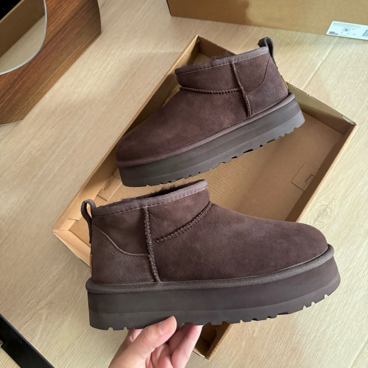 Winter boots with built-in fur on thick soles