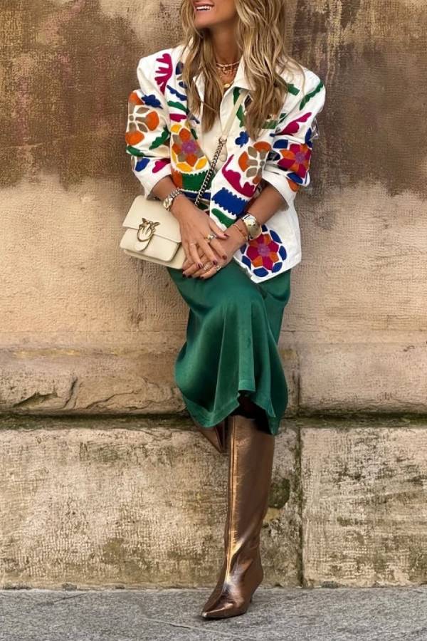 White denim overshirt embroidered with bright colors and pockets