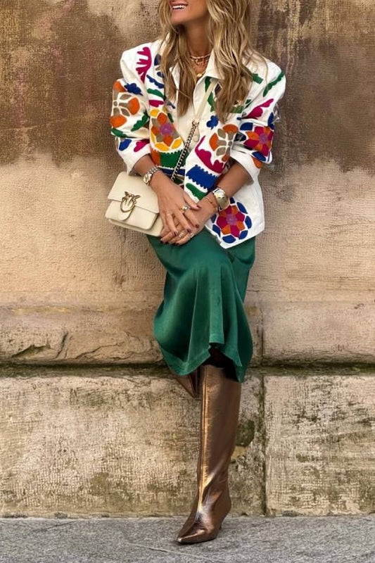 White denim overshirt embroidered with bright colors and pockets