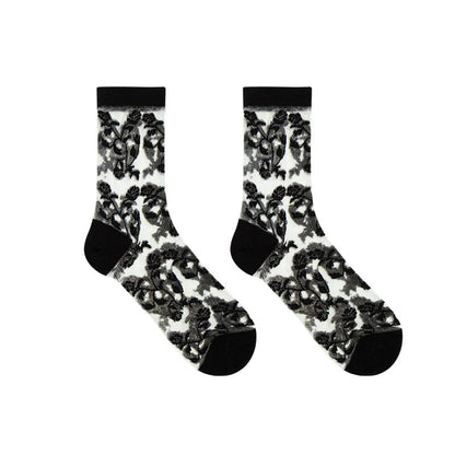 Solid flower pattern mesh long socks