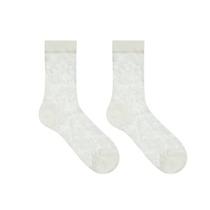 Solid flower pattern mesh long socks