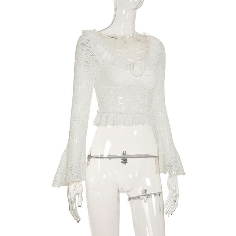 Long flared sleeve lace flower applique top