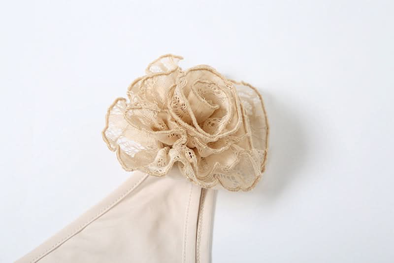Irregular ruffle flower applique top