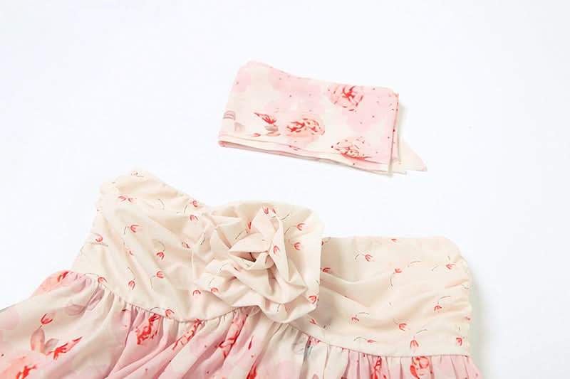 Flower applique ruffle print top