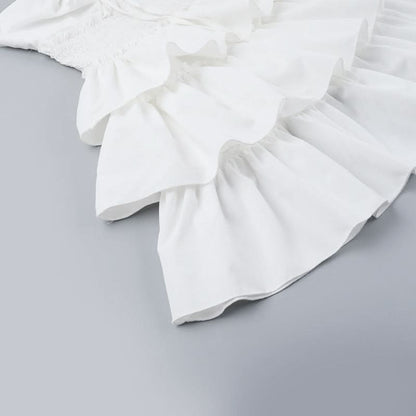 Smocked ruffle self tie mini dress