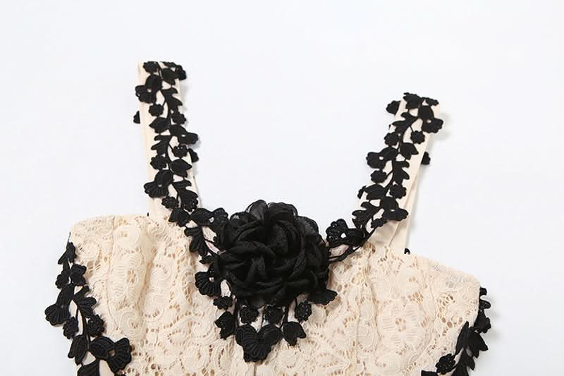 Off shoulder flower applique button top