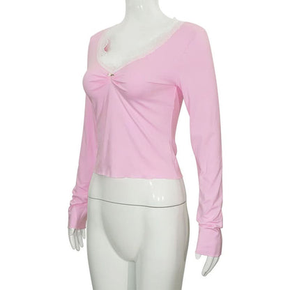 Lace hem long sleeve v neck ruched top