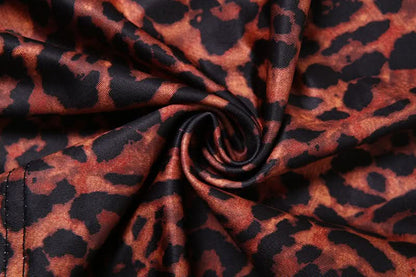 Irregular hollow out leopard print cut out mini dress
