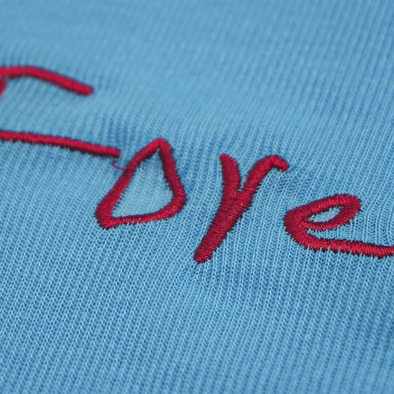 Long sleeve ribbed letter embroidery top
