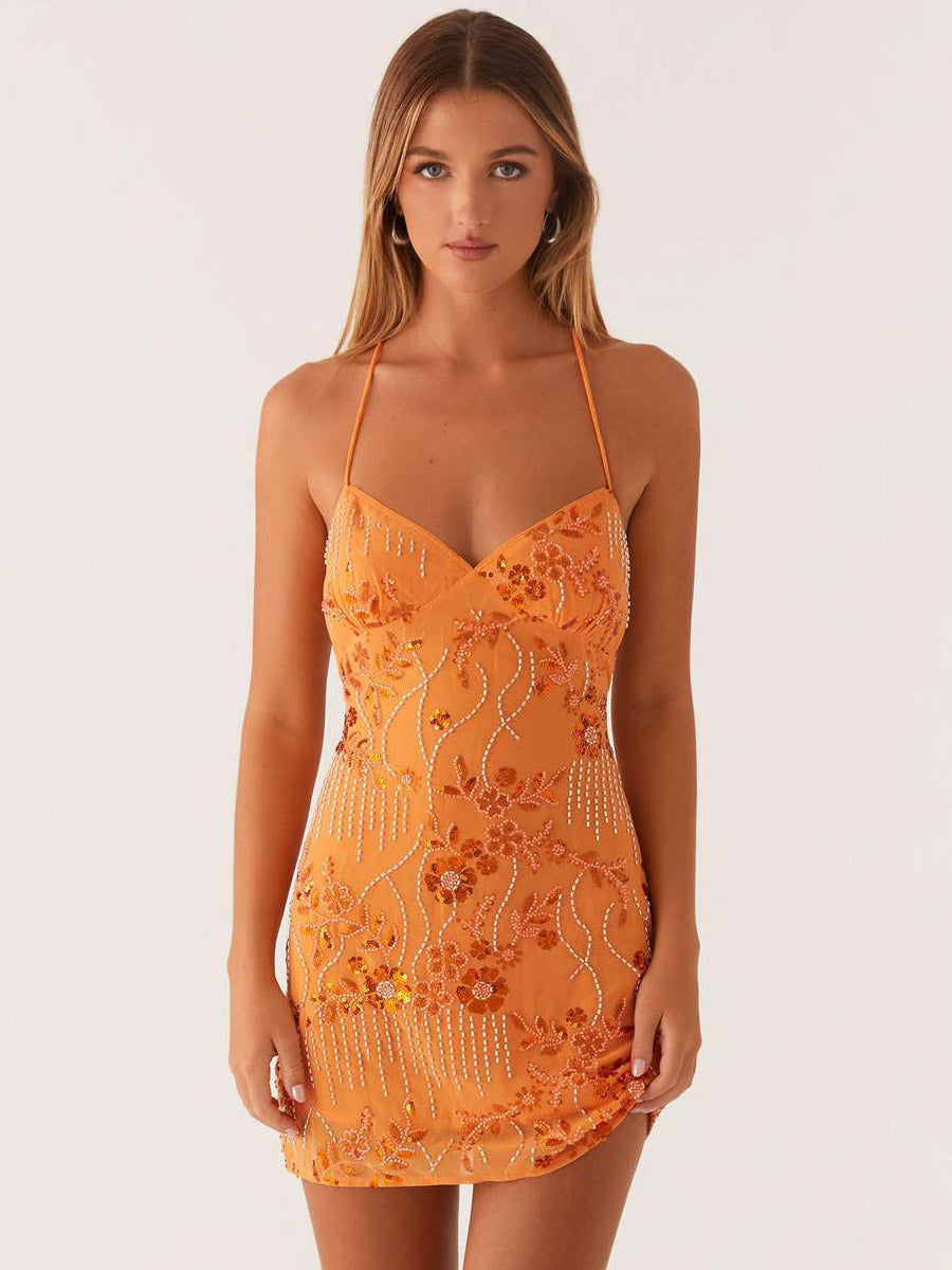 Chic Fitted Orange Gown With Floral Sequin Detail Perfect For Parties