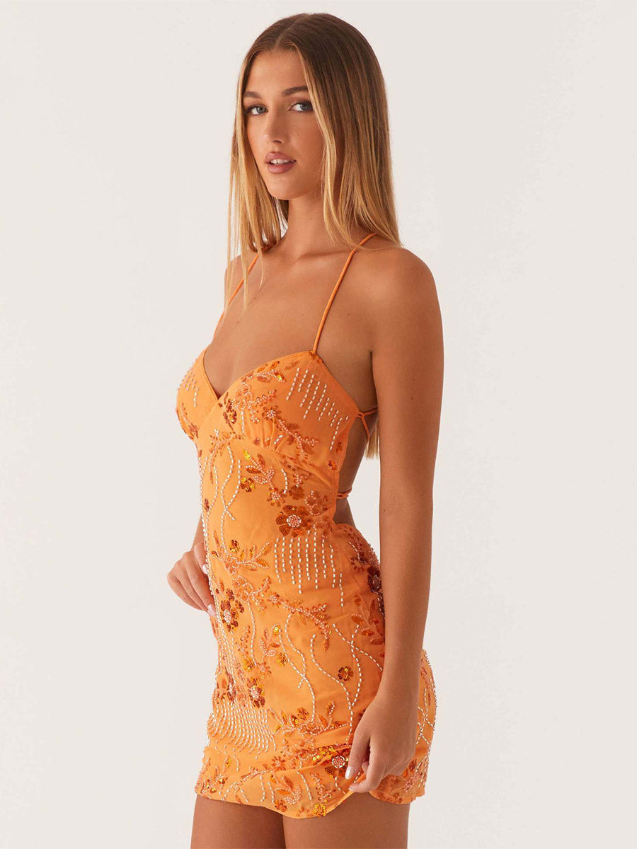 Chic Fitted Orange Gown With Floral Sequin Detail Perfect For Parties