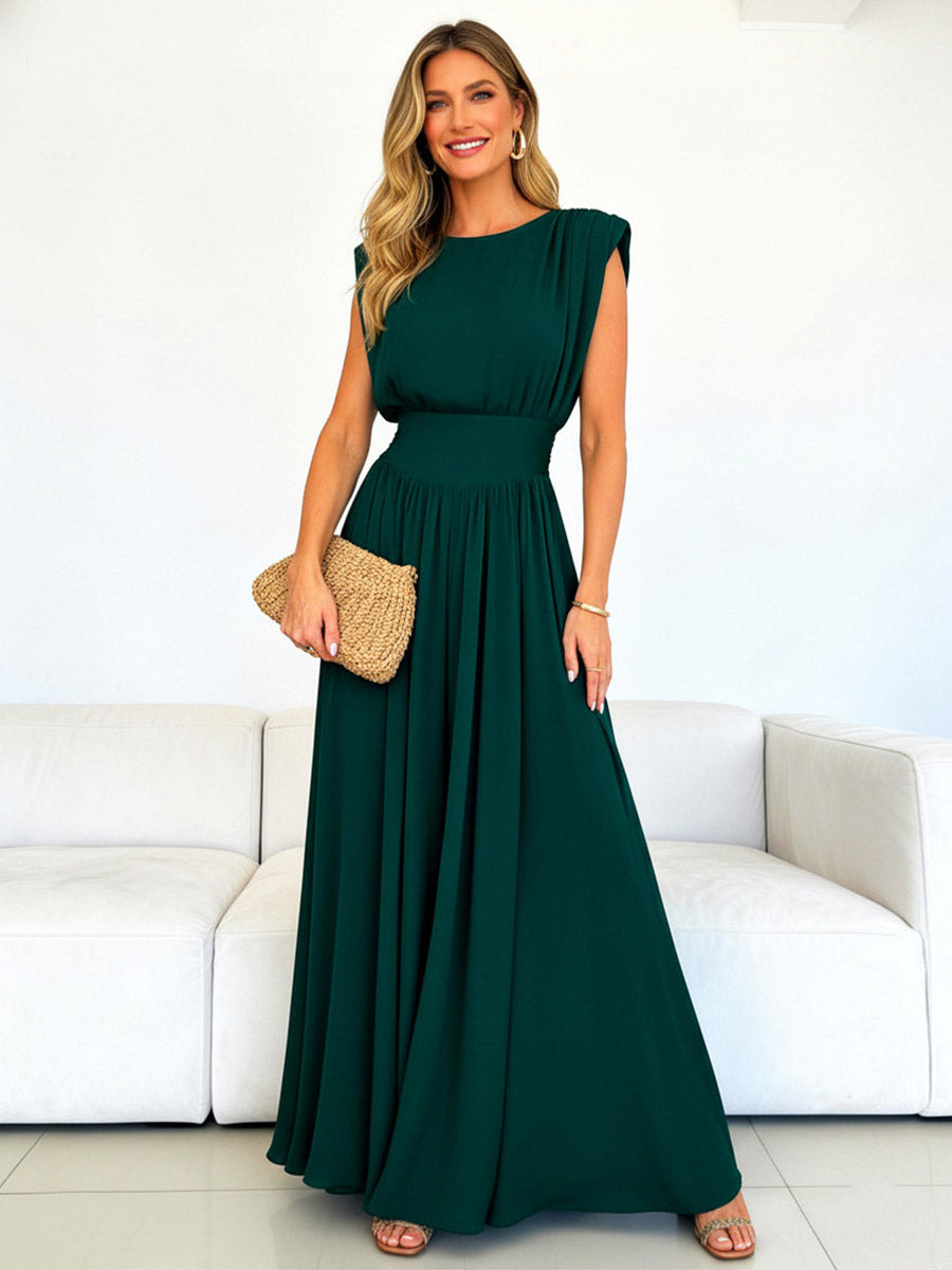 Chic Fitted Emerald Green Gown With Pleated Skirt Perfect For Formal Events