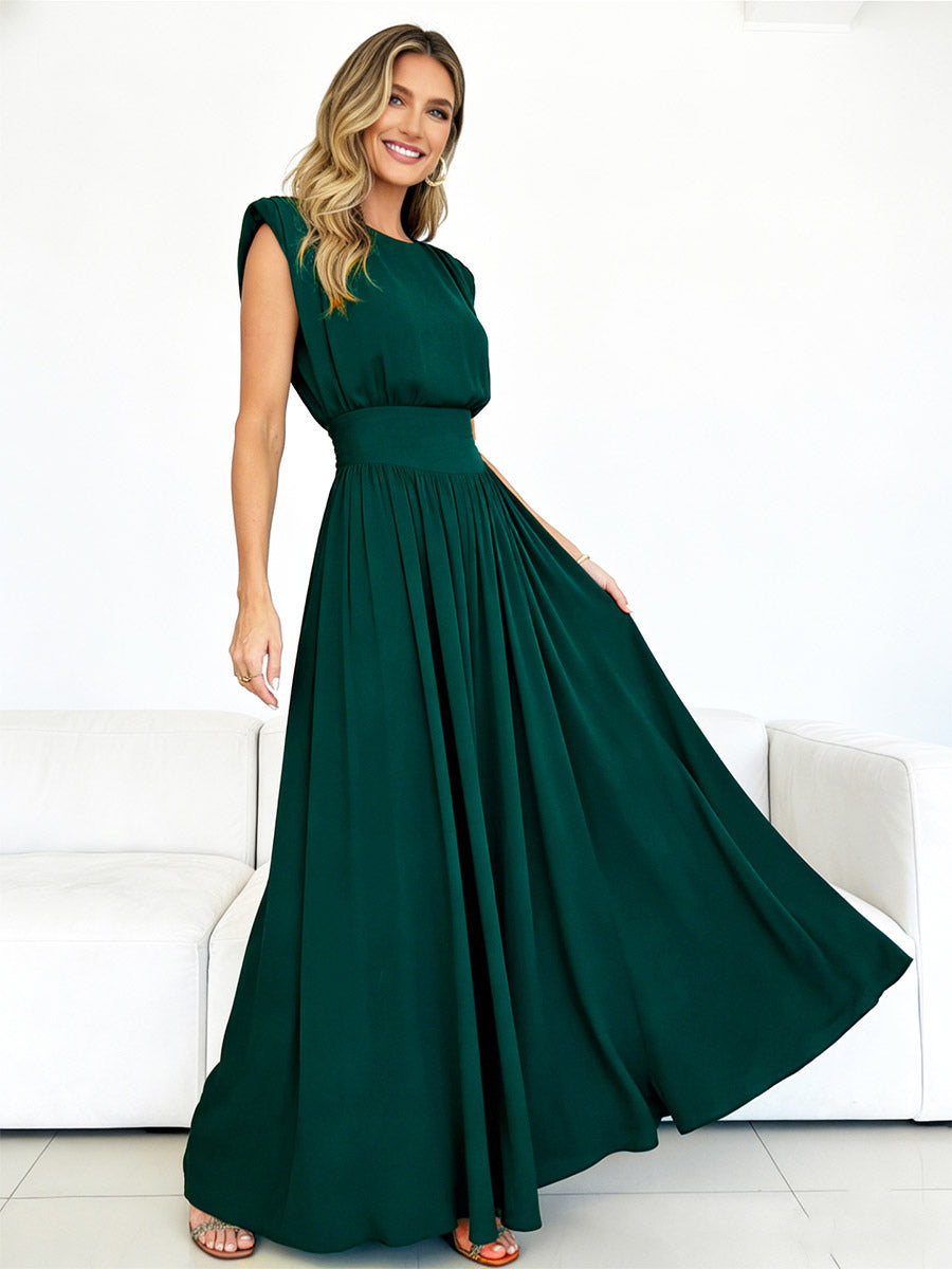 Chic Fitted Emerald Green Gown With Pleated Skirt Perfect For Formal Events