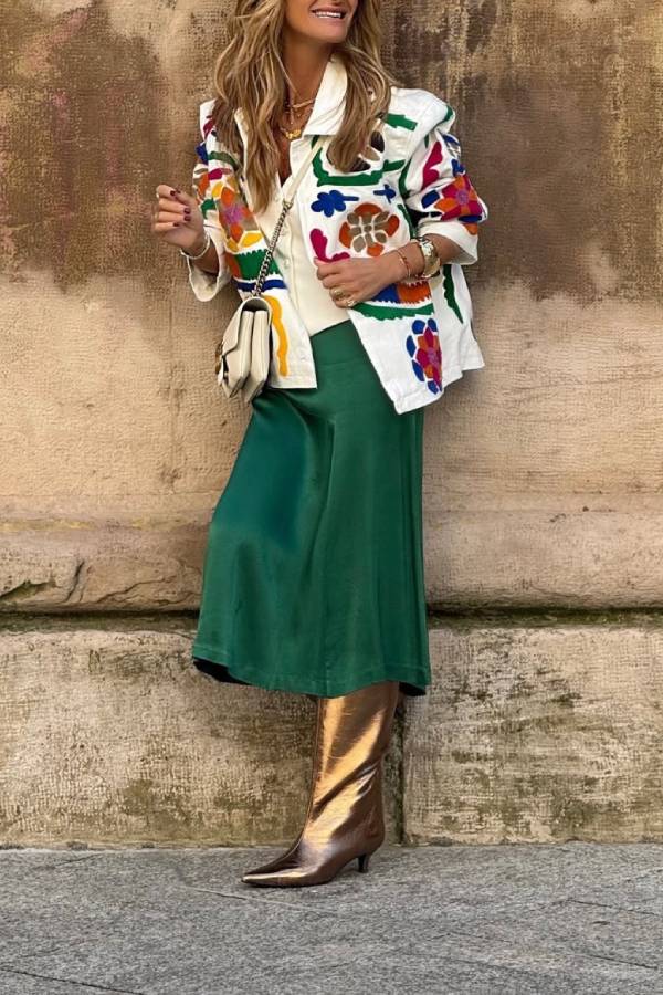 White denim overshirt embroidered with bright colors and pockets