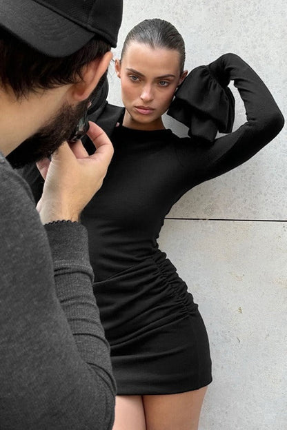 Ribbed Knit Crew Neck Bell Cuff Side Ruched Bow Hip Detail Mini Dress