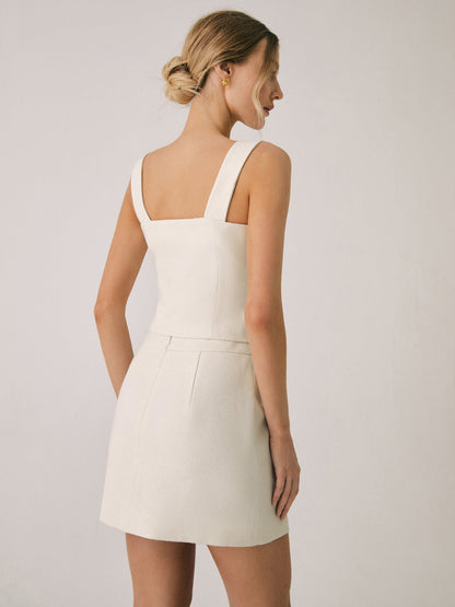 Elegant Pearl Buckle Mini Skirt