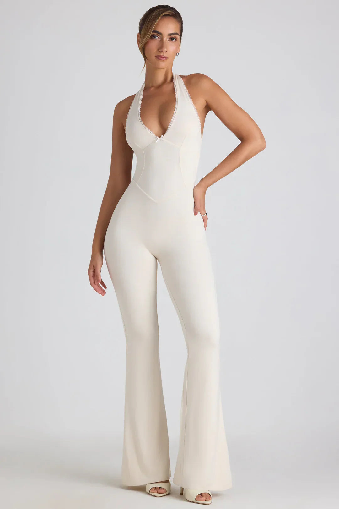 Elegant Black Jumpsuit for Women with Open Back and Halter Neck – Flattering Bodycon Fit for Special Occasions