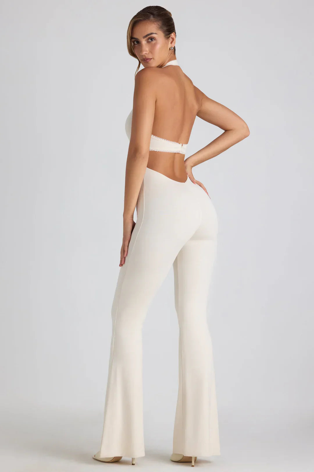 Elegant Black Jumpsuit for Women with Open Back and Halter Neck – Flattering Bodycon Fit for Special Occasions