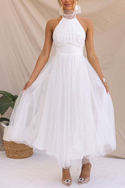 Elegant White Maxi Dress for Women – Flattering Halter Neck, Flowing Silhouette, Perfect for Weddings and Parties