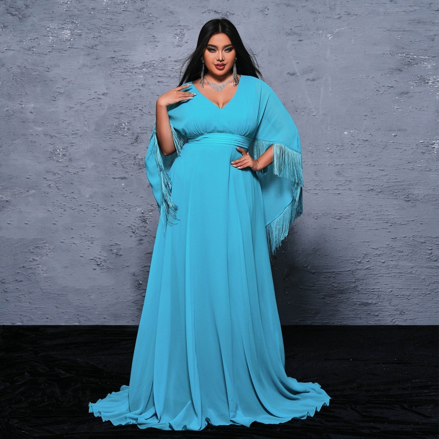 Deep V-Neck Cape Sleeve Fringe Trim Empire Waist Pleated Maxi Gown