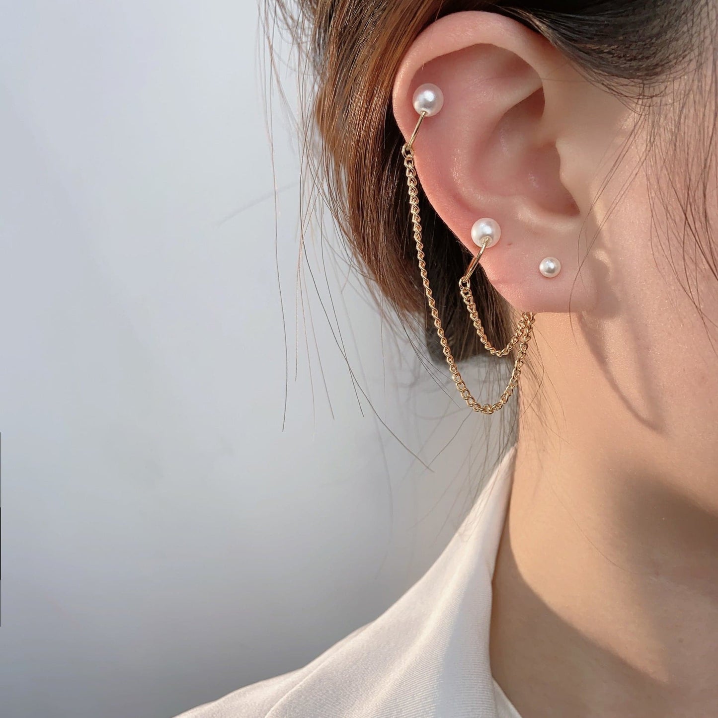 Faux pearl layered metal chain stud earrings