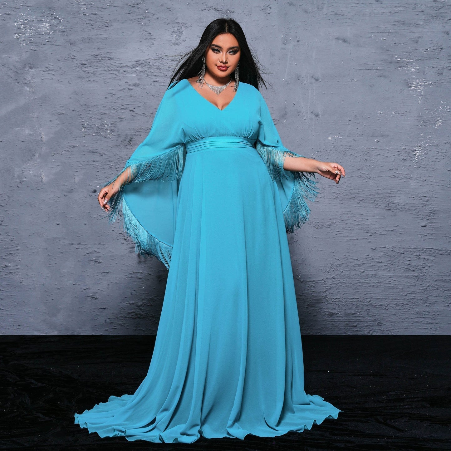 Deep V-Neck Cape Sleeve Fringe Trim Empire Waist Pleated Maxi Gown