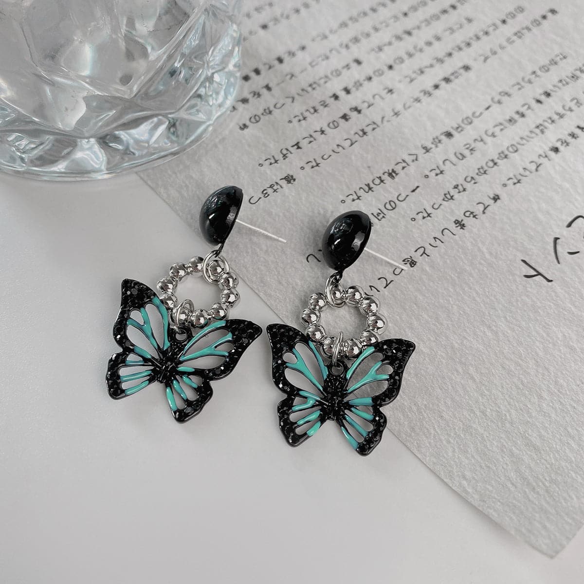 Butterfly decor faux pearl stud earrings