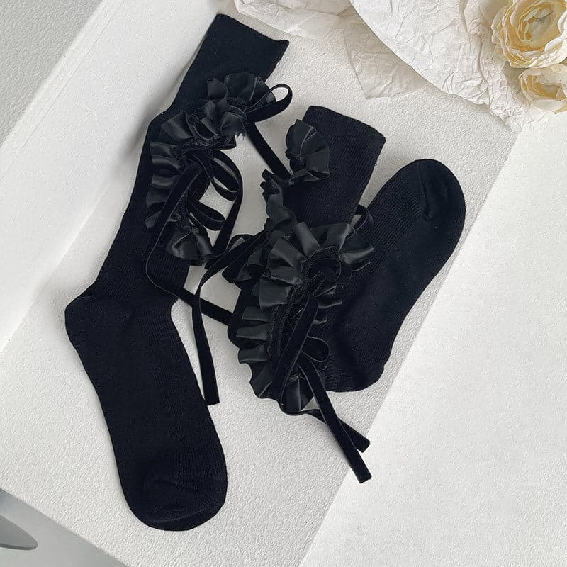 Hollow out bowknot ruffle irregular knee high socks