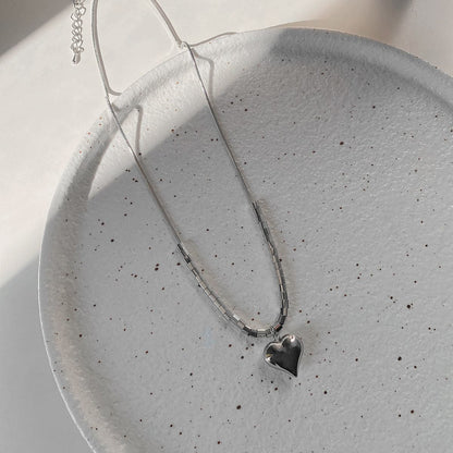 Heart pendant beaded metal chain necklace