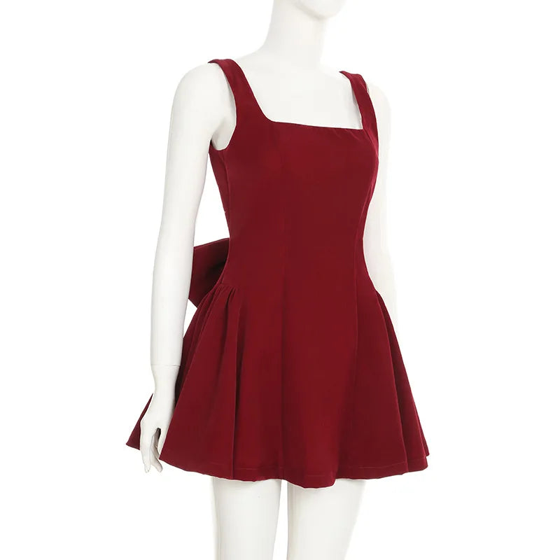 Spaghetti Strap Open Back Oversized Bow Flared Mini Dress