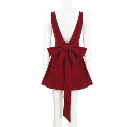 Spaghetti Strap Open Back Oversized Bow Flared Mini Dress