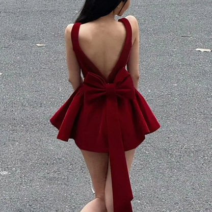 Spaghetti Strap Open Back Oversized Bow Flared Mini Dress