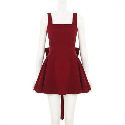 Spaghetti Strap Open Back Oversized Bow Flared Mini Dress