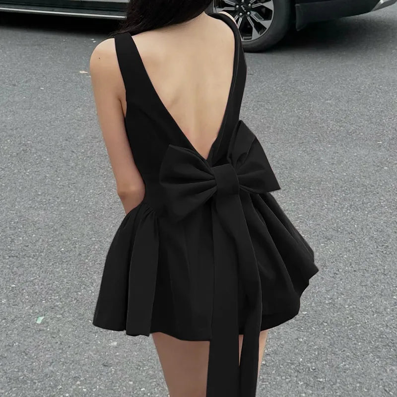 Spaghetti Strap Open Back Oversized Bow Flared Mini Dress