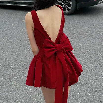 Spaghetti Strap Open Back Oversized Bow Flared Mini Dress