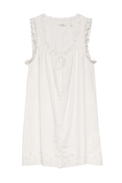 Short Skirt with Pearl Buttons and Scalloped Trim and Round Neck.