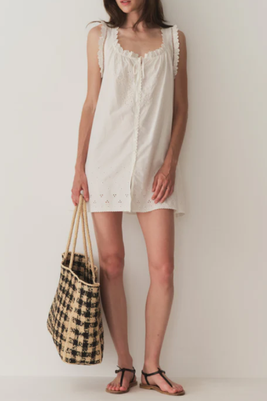 Short Skirt with Pearl Buttons and Scalloped Trim and Round Neck.