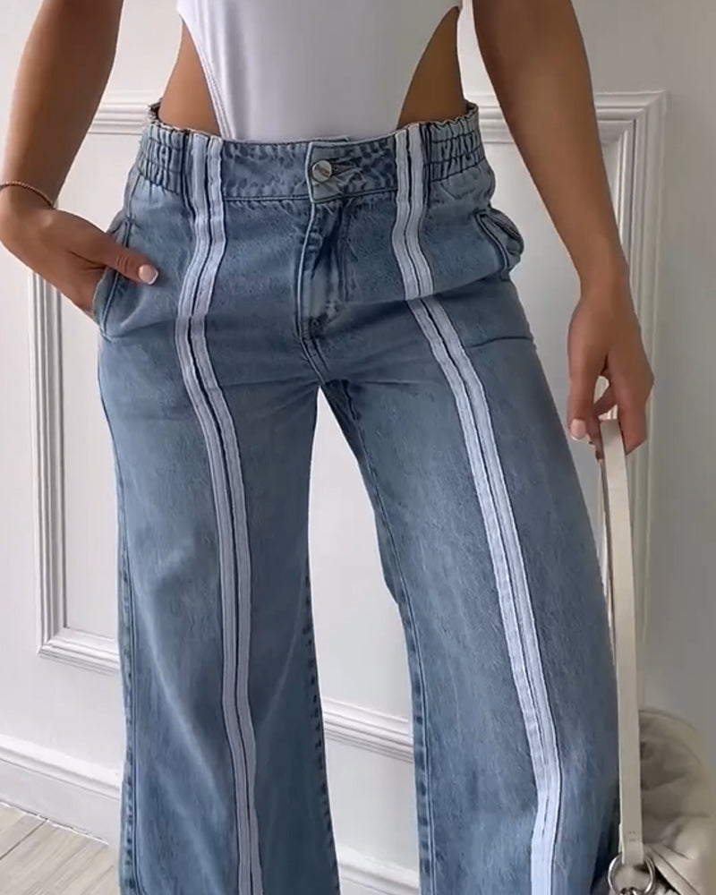 Loose High-Waisted Jeans With Vertical Slits