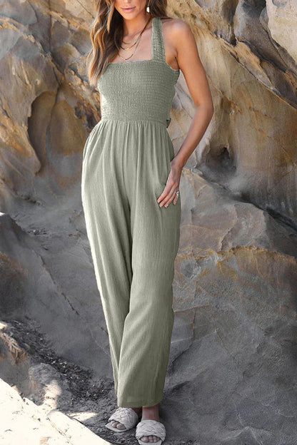 Fashion casual collarless straight wide leg open back cross strap jumpsuit