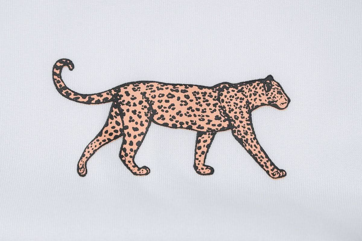 Long sleeve crewneck leopard pattern zip-up top