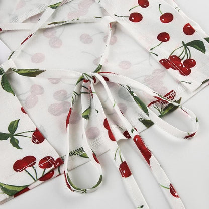 Cap sleeve u neck cherry print lace up top