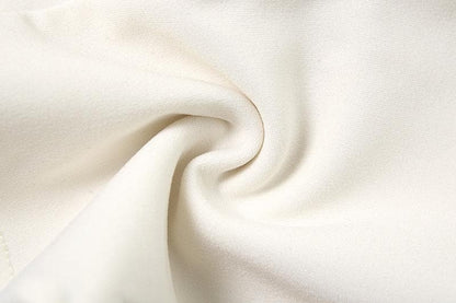 Flower applique backless solid tube top