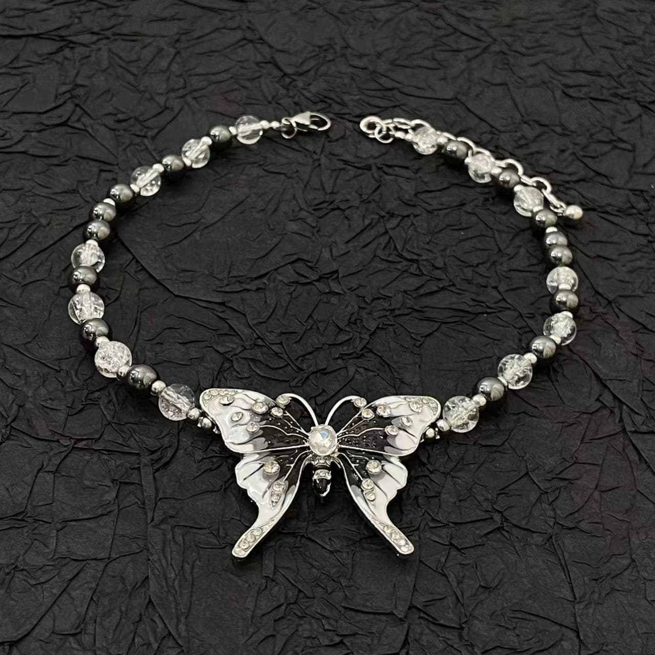 Butterfly beaded black and white necklace