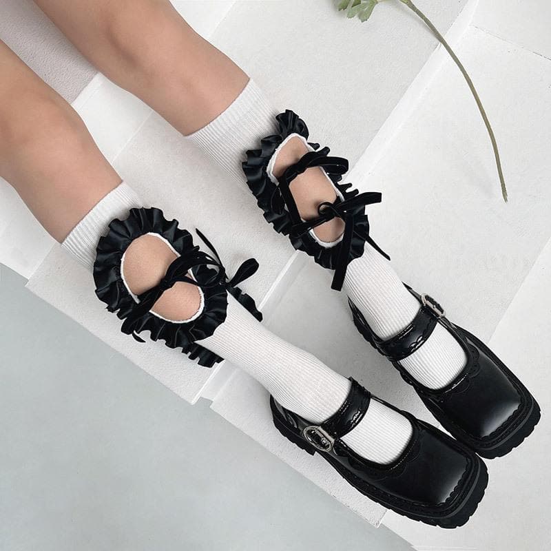 Hollow out bowknot ruffle irregular knee high socks