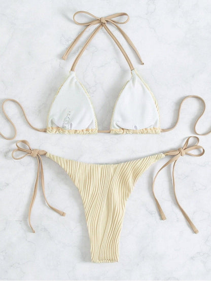 Solid halter textured self tie padded bikini swimwear
