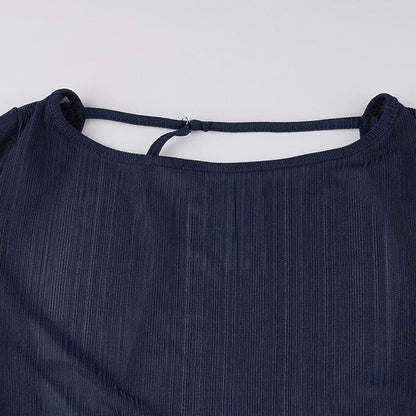 Self tie backless round neck long sleeve textured top